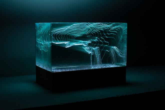 Sculpture. Laser etched glass block, LCD backlight, wooden base
